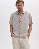 Men’s Rag & Bone Dalton Jacquard Short Sleeve Shirt in Pale Taupe SS Valentine Stripe with button front and subtle jacquard stripe pattern.