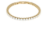 QUDO Cassio crystal tennis bracelet in gold, available at Low Key Fashion House in Key West, Florida