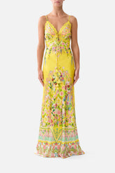 Camilla Lady Limonada bias cut silk charmeuse slip dress in lemon yellow with vibrant floral print, matching yellow lace trim at V-neckline, 3D lace floral appliqué, crystal embellishments, and adjustable spaghetti straps