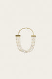Cult Gaia Nora 3-row Keshi freshwater pearl choker necklace with brass lobster clasp closure on white background
