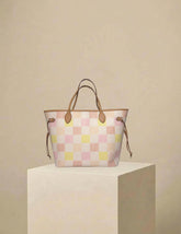 Louis Vuitton Neverfull MM Limited Edition Tote in Damier Ebene Pastel with gold hardware — authenticated pre-owned at Low Key Fashion House
